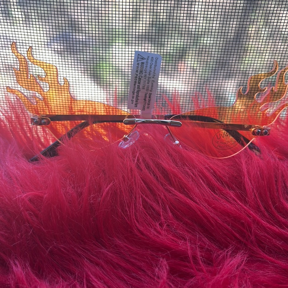 Orange or red 🔥 women’s sunglasses $10 each
